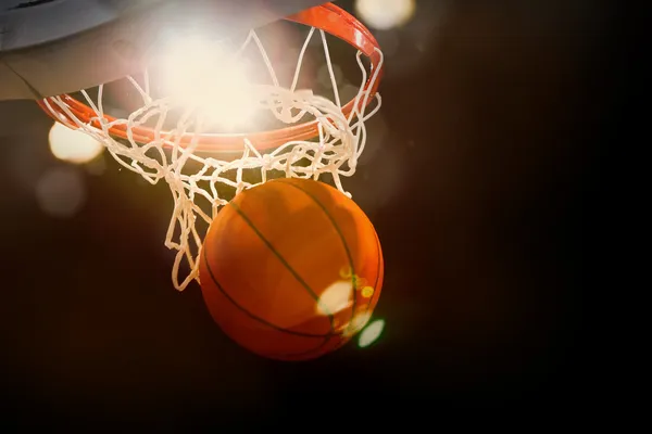 depositphotos_46221797-stock-photo-basketball-going-through-the-basket.webp